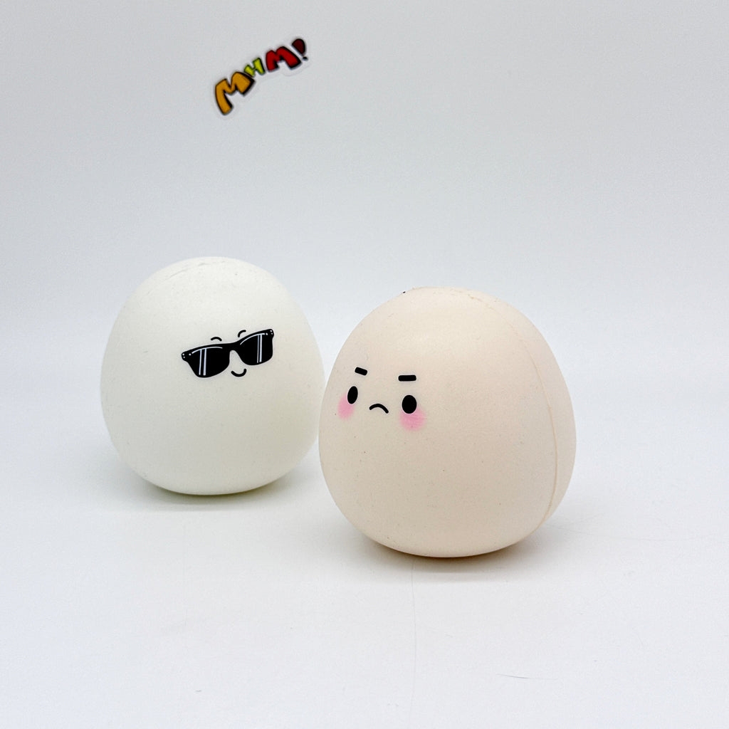 Boiled eggs and raw eggs, gently squish and have fun!
